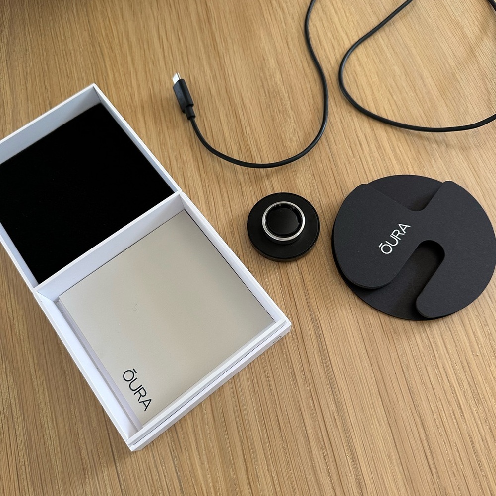 Oura Brushed Titanium Size 12. Excellent condition. Box & charger included.